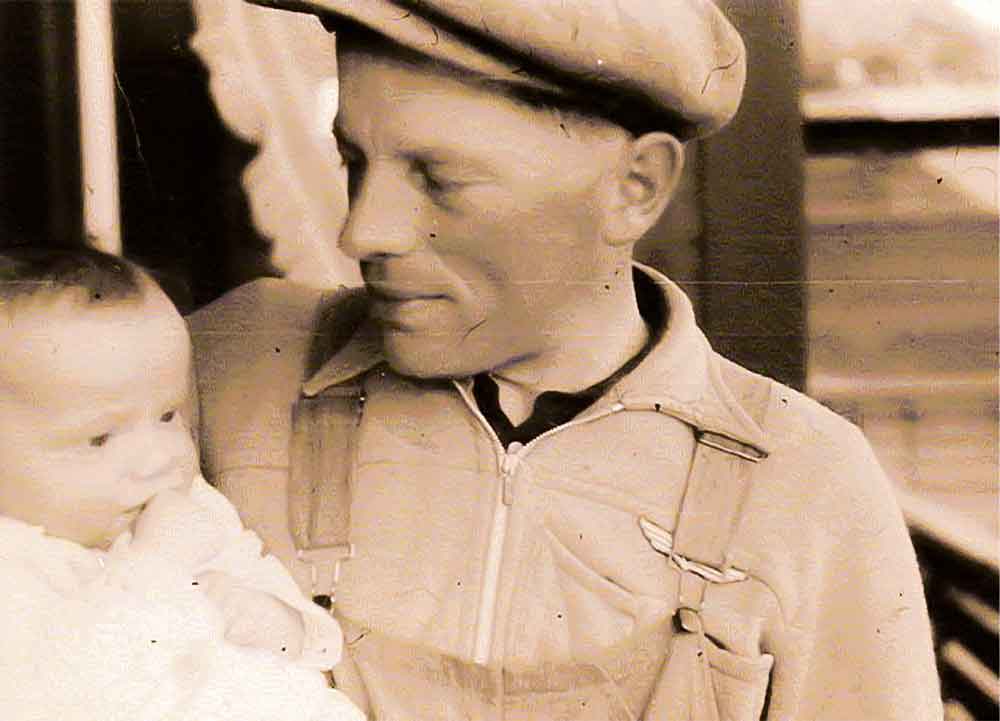 Grandpa with Child on Arm